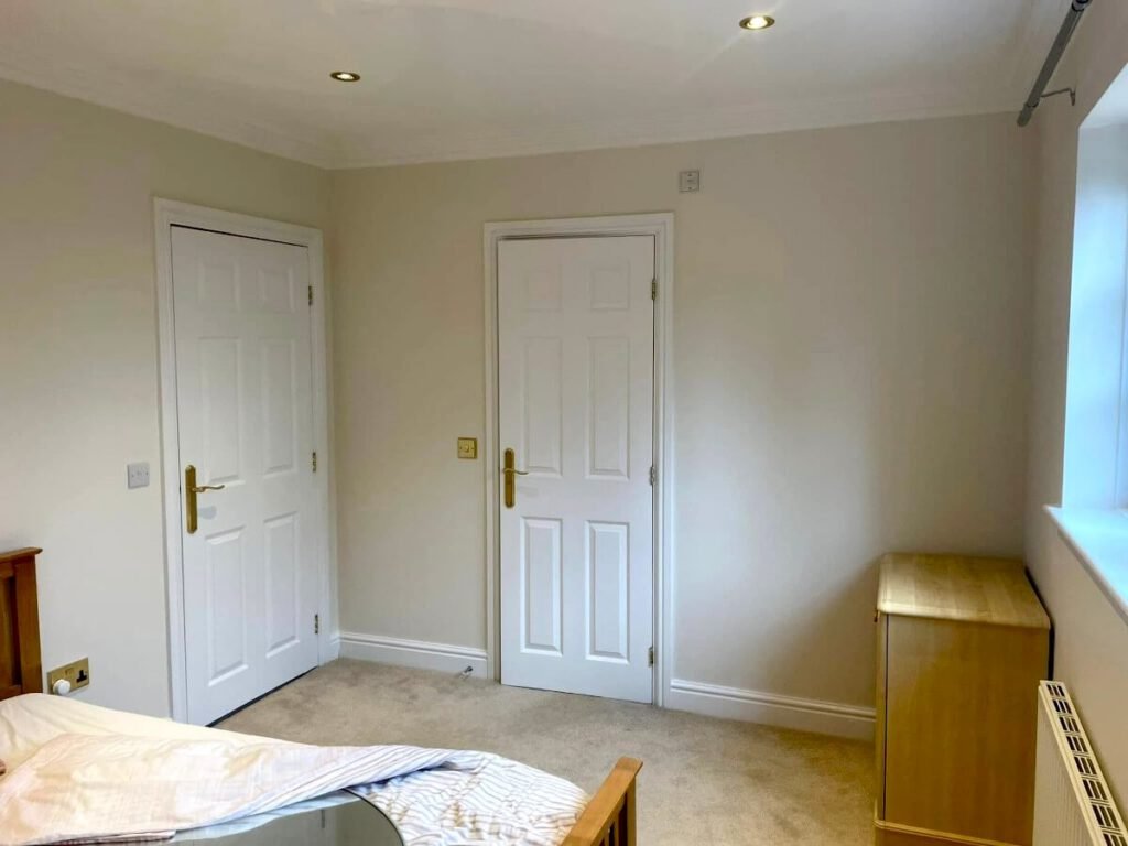 bedroom cream painted walls two doors cardiff primrose decor