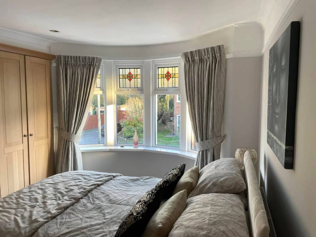 bedroom grey painted walls bay window stained glass cardiff primrose decor