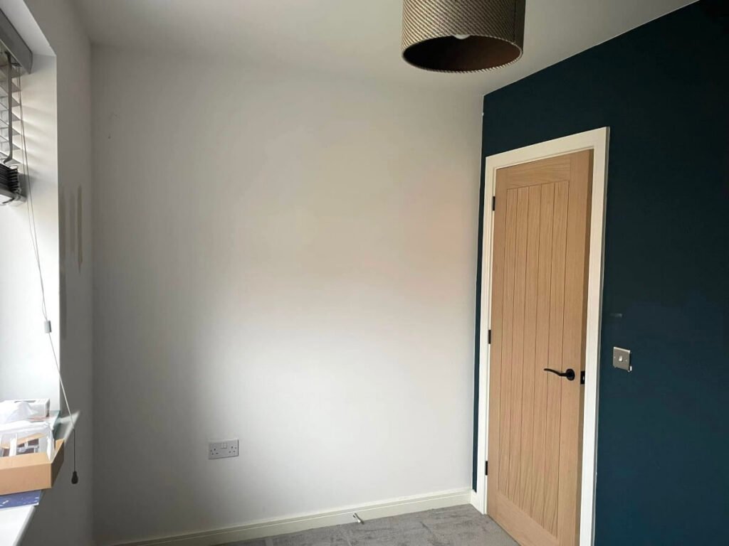 bedroom white navy painted walls feature wall cardiff primrose decor