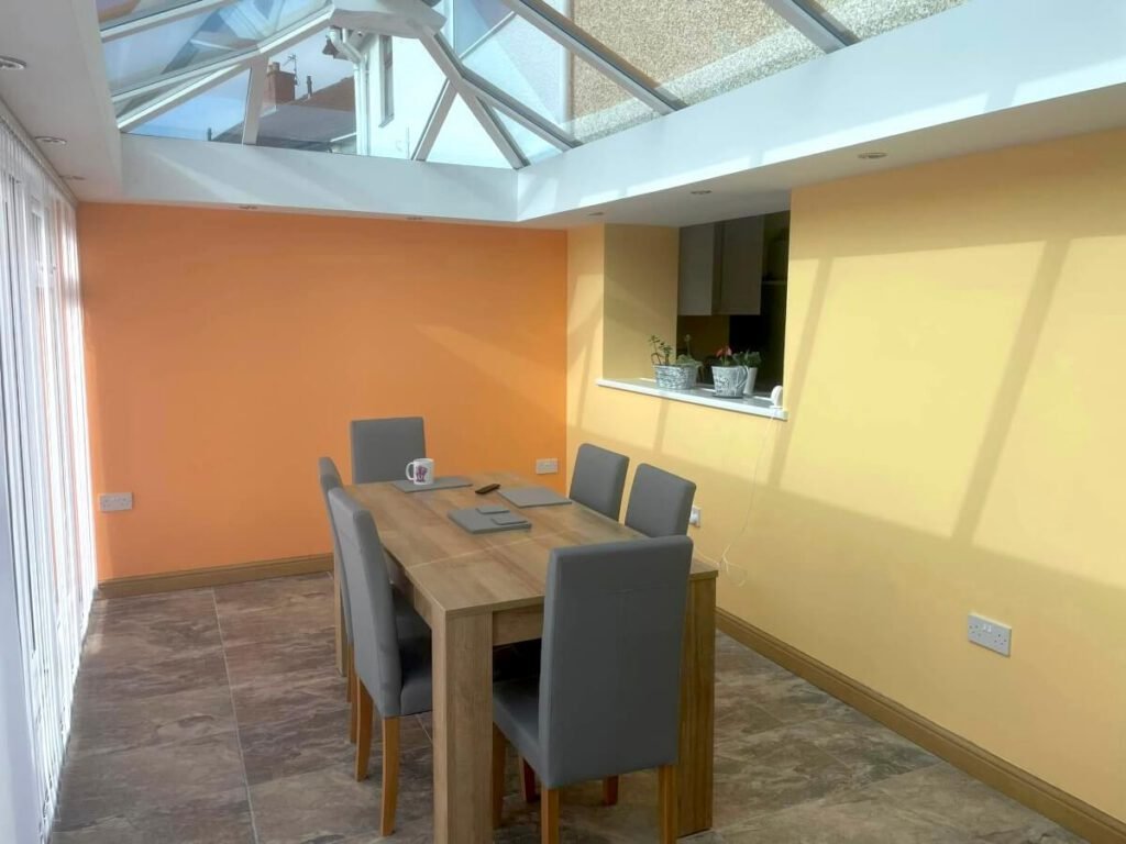 dining room yellow orange painted walls skylight cardiff primrose decor