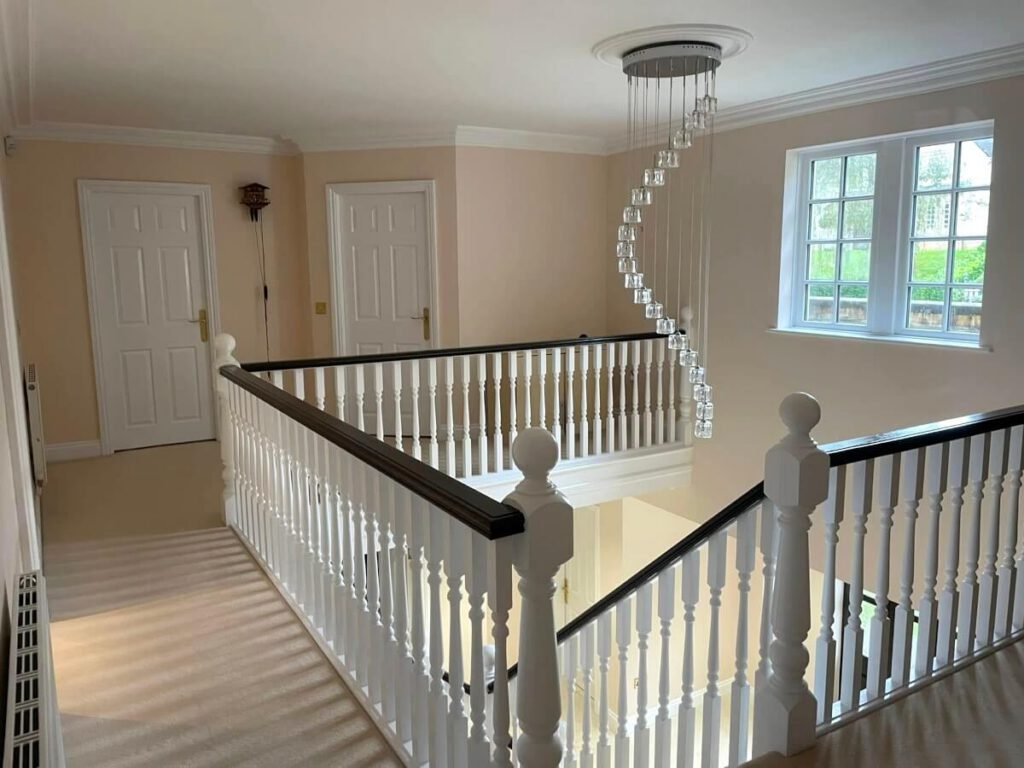 landing beige painted walls window chandelier cardiff primrose decor