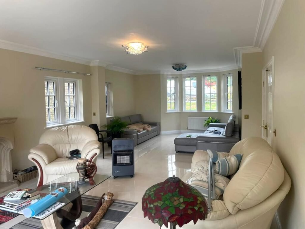 living room beige painted walls bay windows cardiff primrose decor