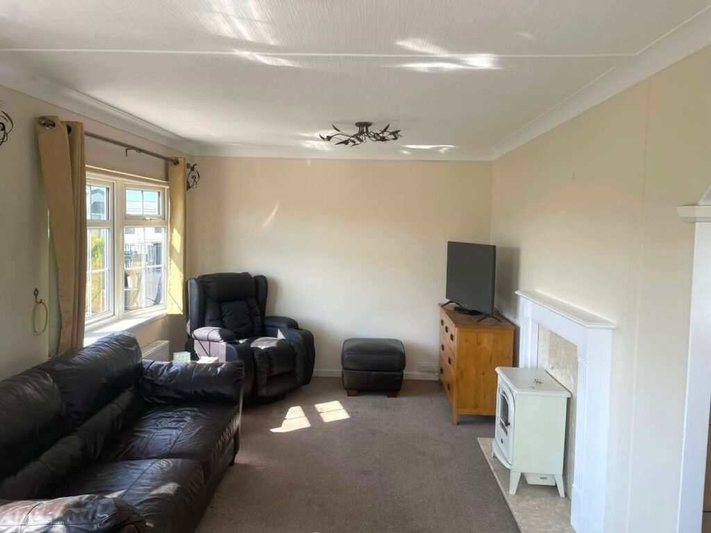 living room beige painted walls ceiling light tv cardiff primrose decor