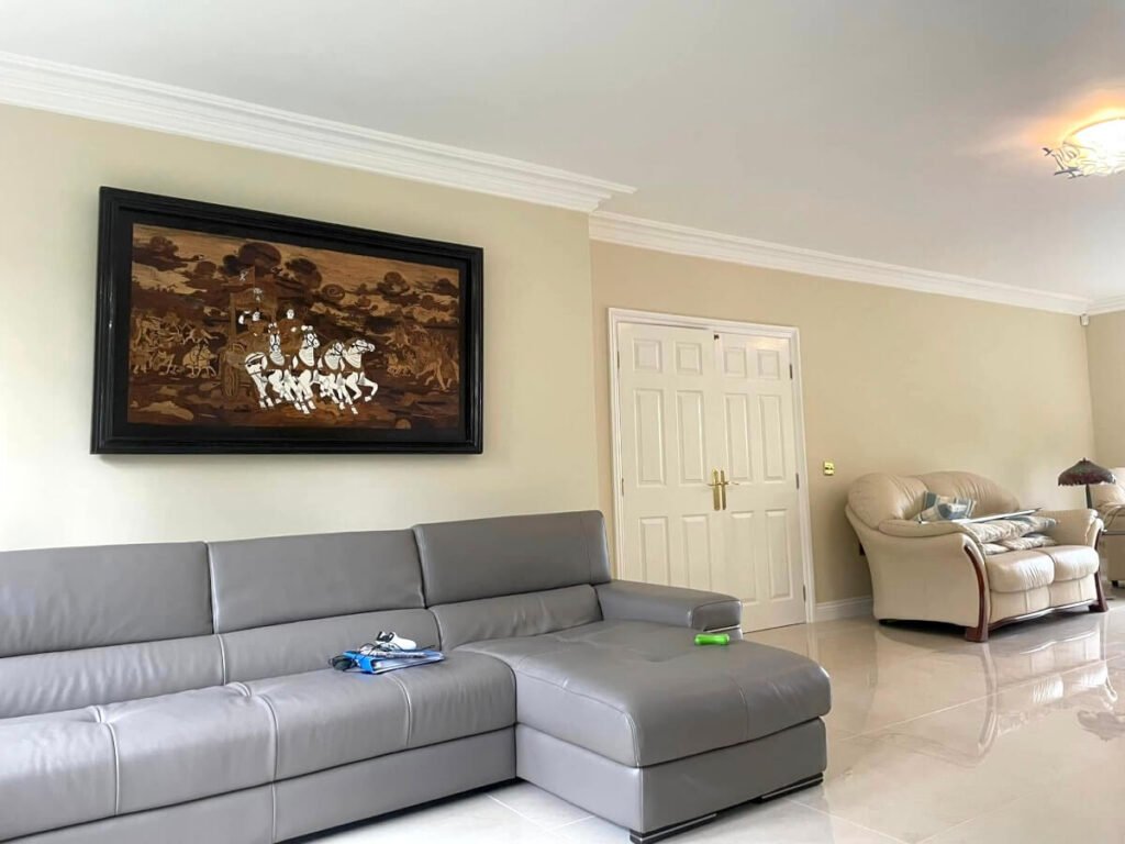 living room beige painted walls grey sofa artwork cardiff primrose decor