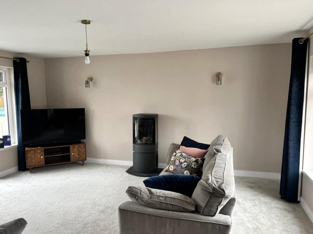 living room beige painted walls wood burner stove cardiff primrose decor