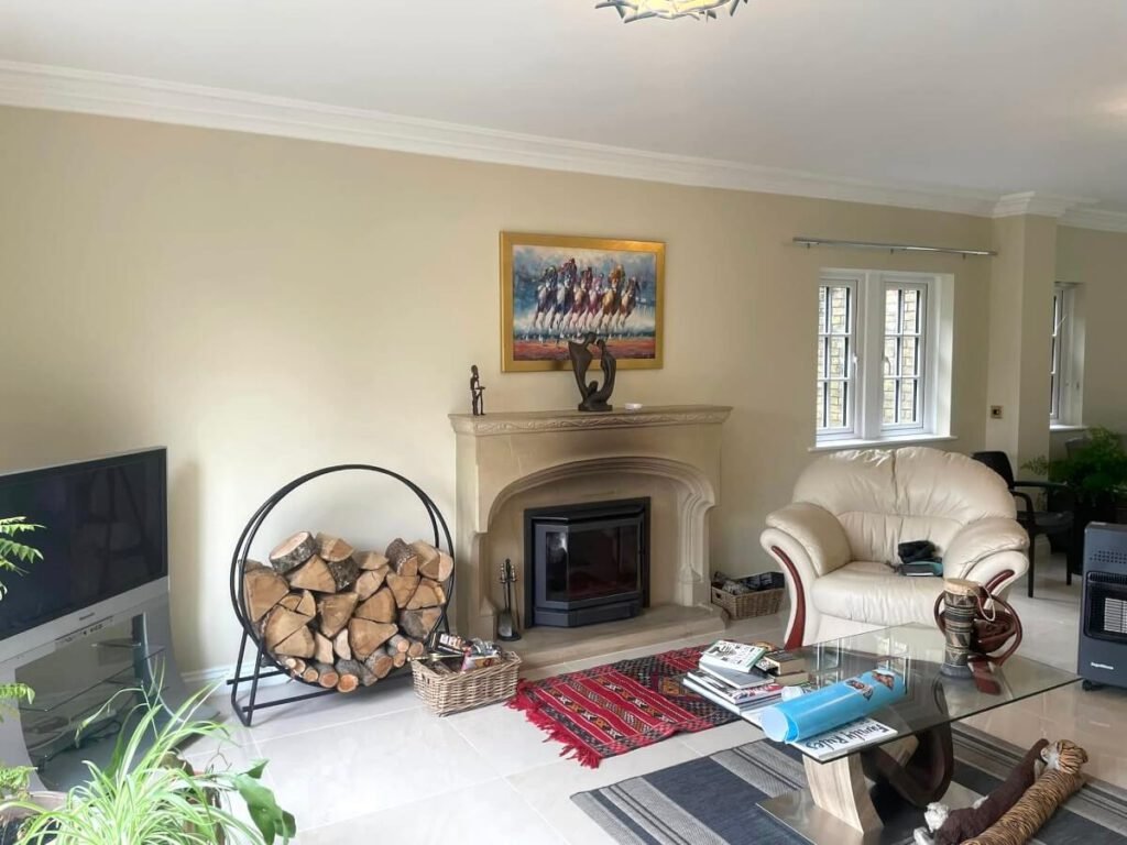 living room cream painted walls stone fireplace cardiff primrose decor