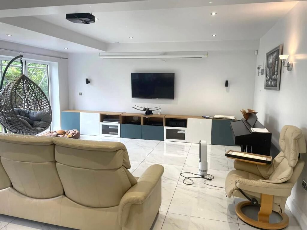 living room white painted walls tv unit tiled floor cardiff primrose decor