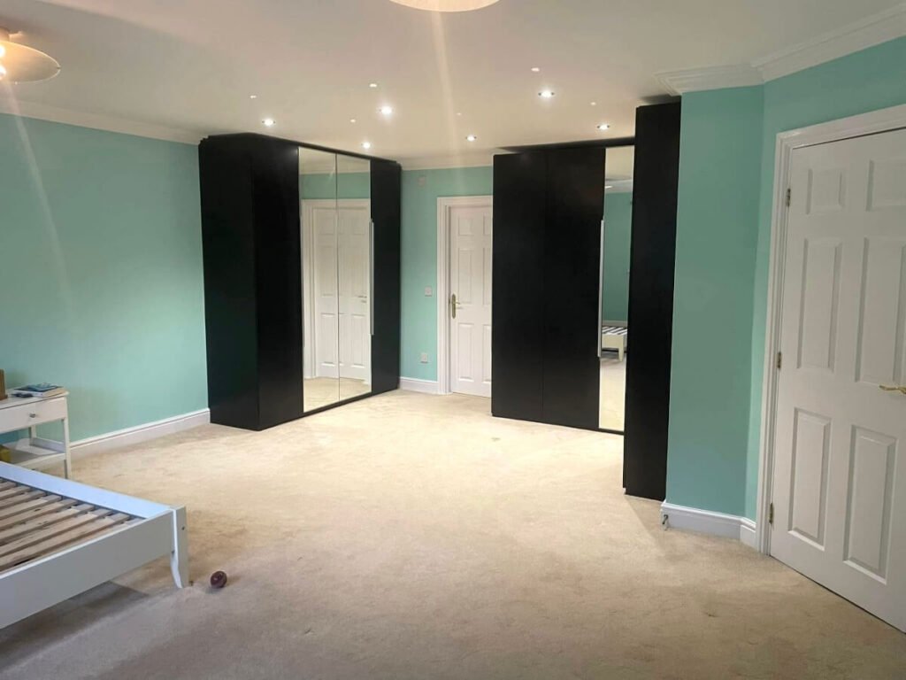 master bedroom aqua painted walls mirrored wardrobes cardiff primrose decor